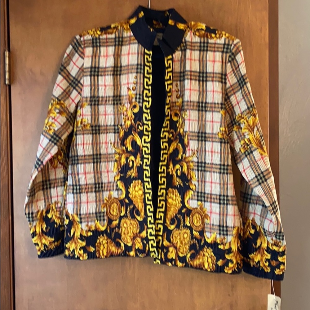 Pleat Pleat By Rafael Zip up jacket.